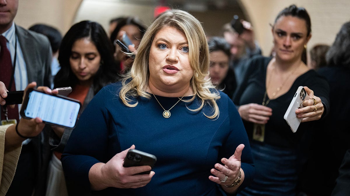 Rep. Kat Cammack amid press in hallway
