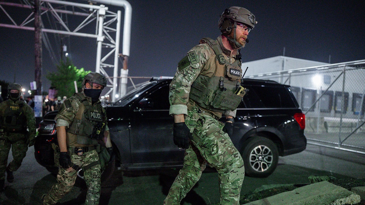 DHS in camo tactical gear