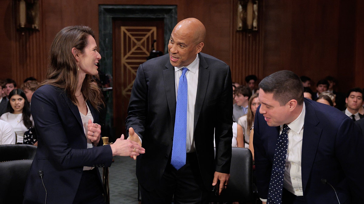 Booker shakes Shaw's hand before Senate Judiciary hearing