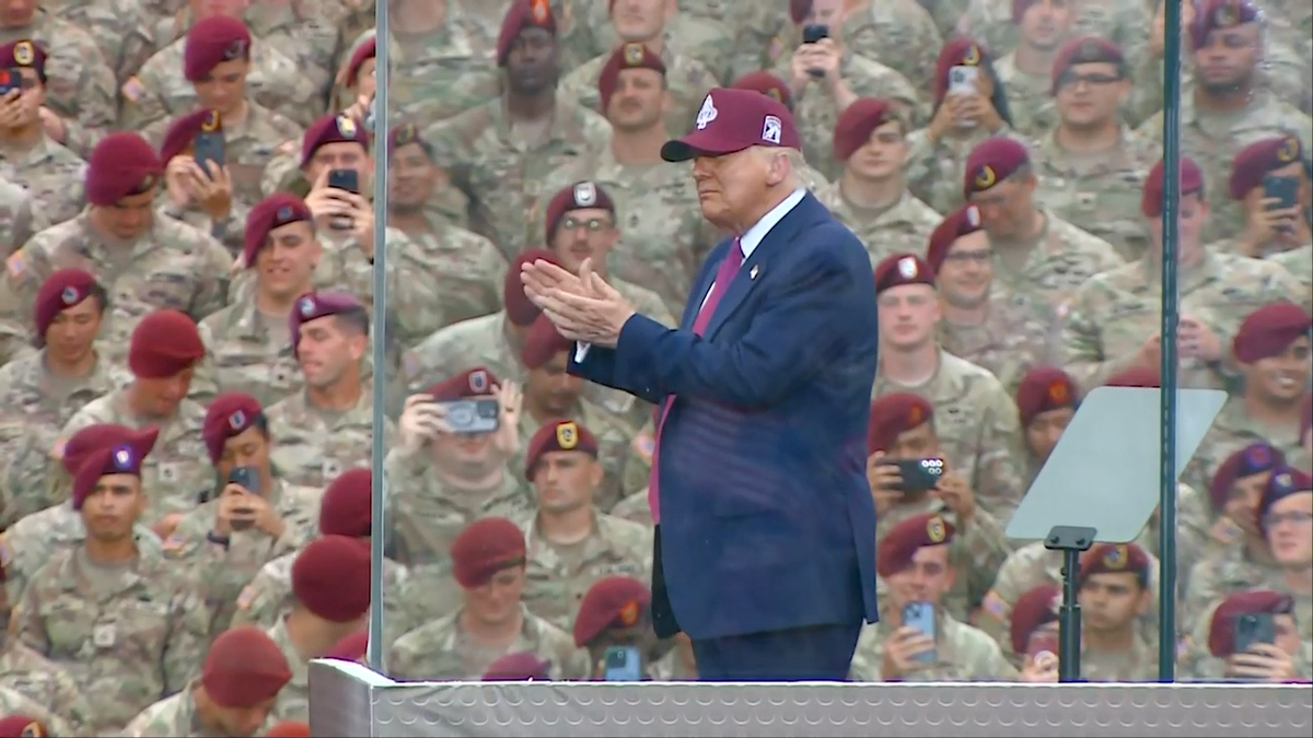 President Donald Trump clapping at Fort Bragg