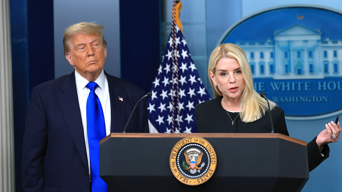 Donald Trump and Pam Bondi in the White House press briefing room