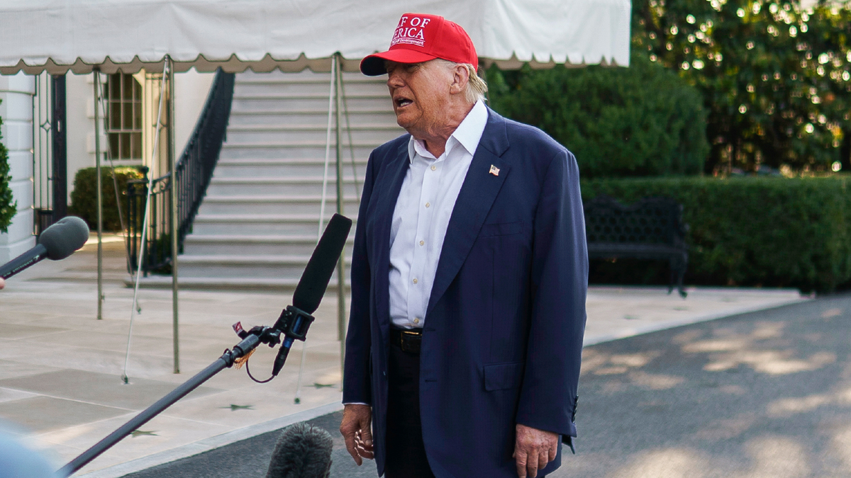 President Trump talks to the media about former ally Elon Musk outside of the White House. 
