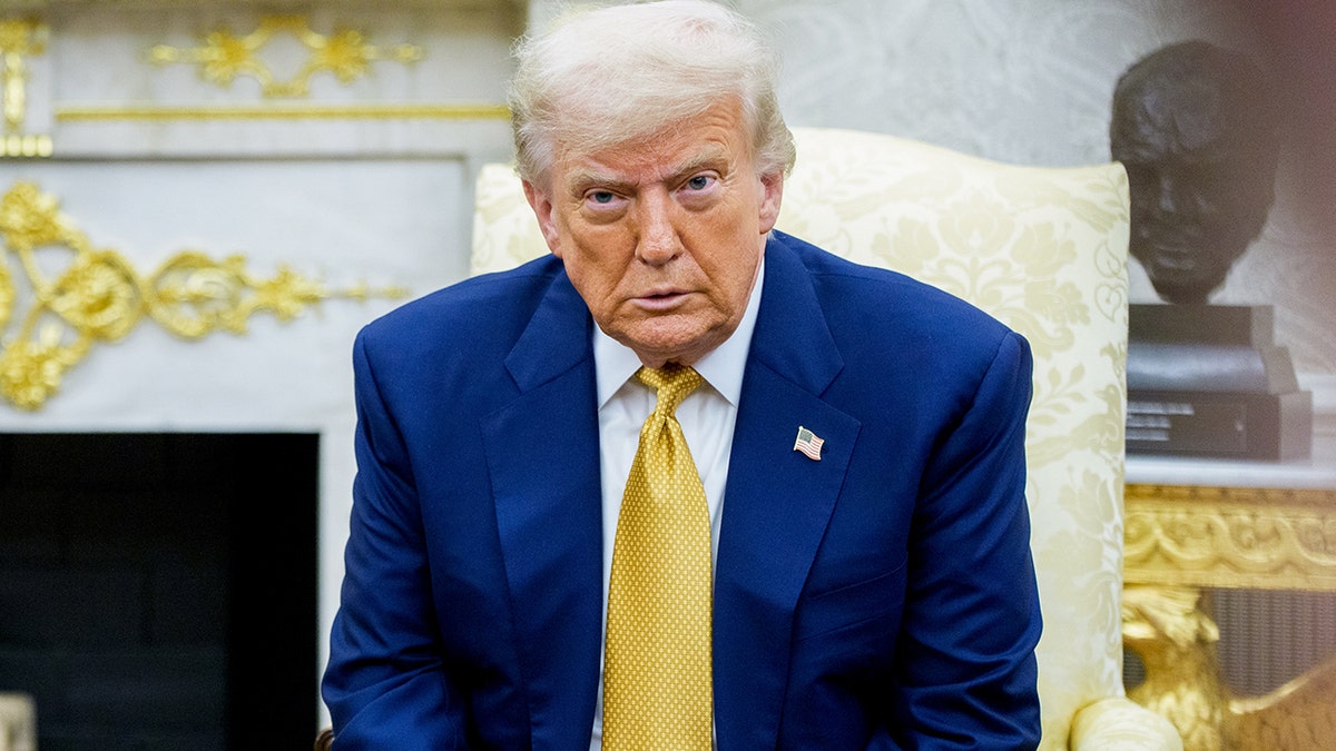 Donald Trump takes questions at the White House