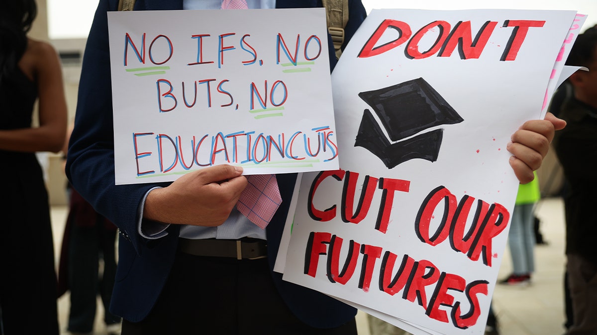 GMU student protesting at Education Department