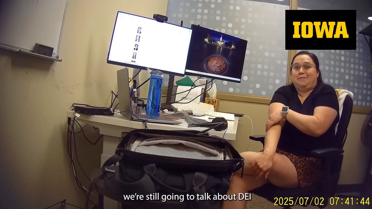 hidden camera still of University of Iowa official