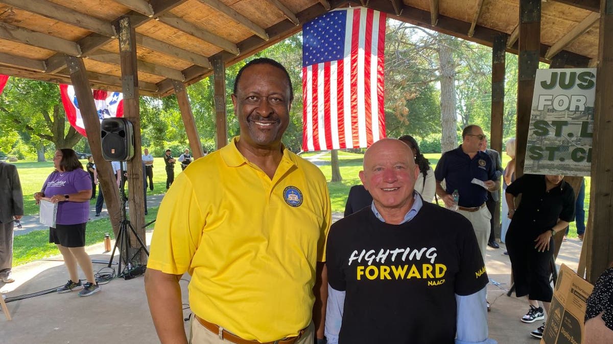 NAACP St. Louis President John Bowman with his environmental chair, Bruce Morris.