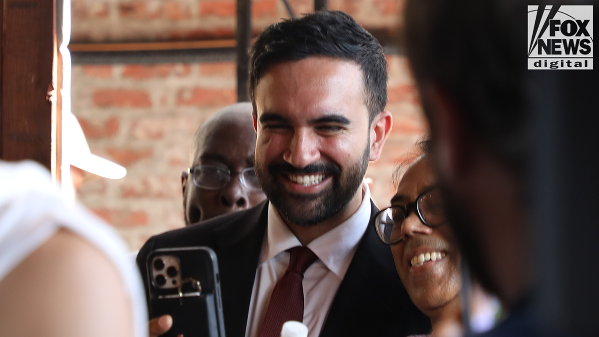Zohran Mamdani smiling