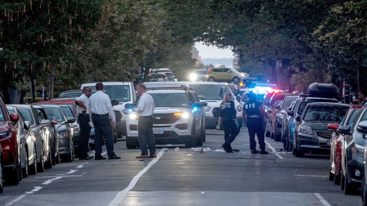 Metropolitan Police Department officers investigate a shooting on August 11, 2025 in Washington, DC. The shooting comes amid a federal takeover of DC police and mobilization of the National Guard that President Donald Trump says is necessary to restoring order in the city.