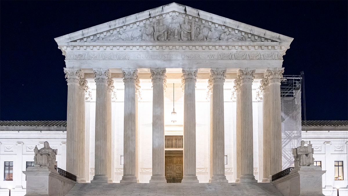 supreme court at night lit up