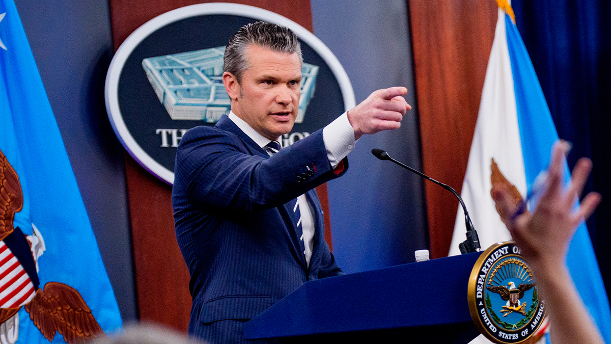 Hegseth briefs reporters.