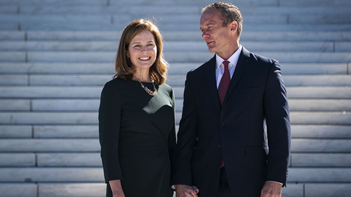 Justice Barrett pictured with her husband