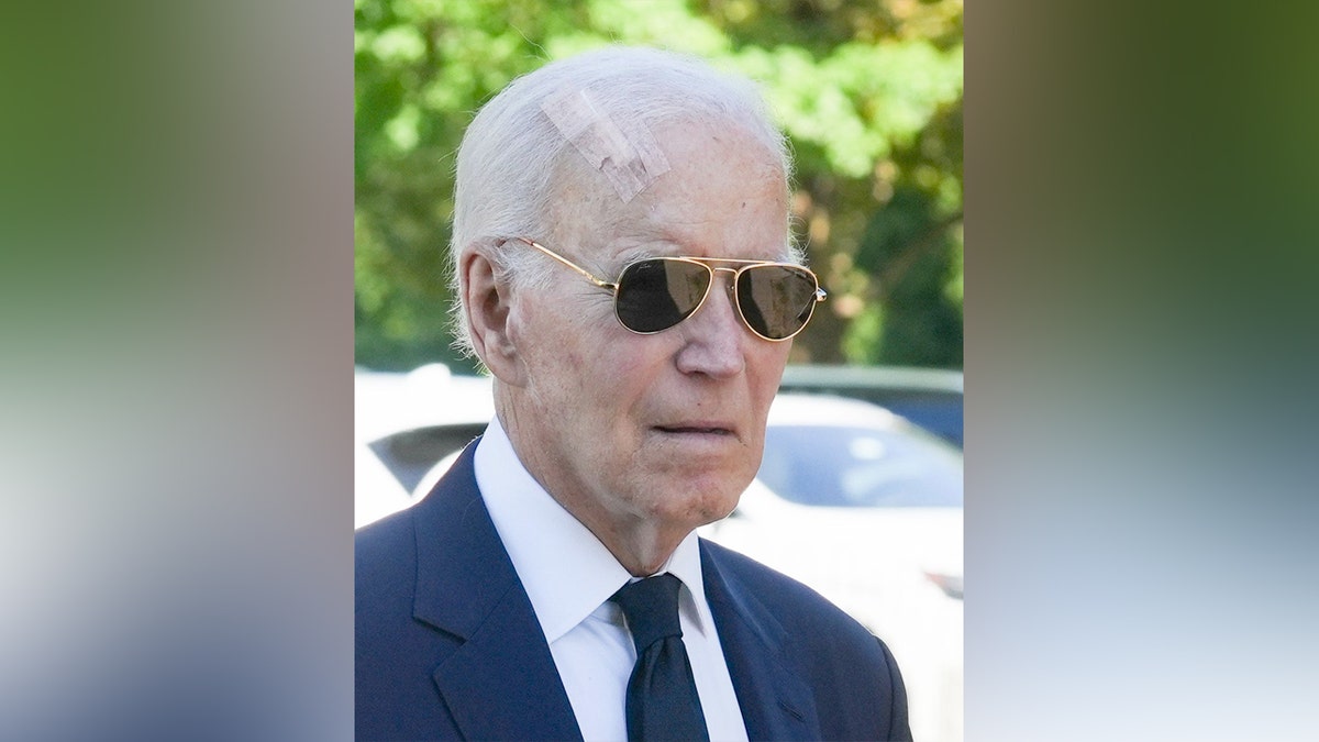 Biden spotted with a large bandage on his head
