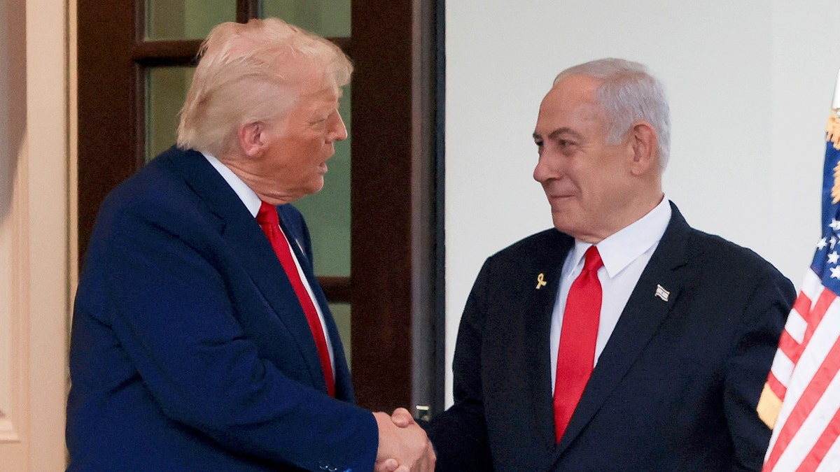 President Donald Trump shakes hands with Israeli Prime Minister Benjamin Netanyahu