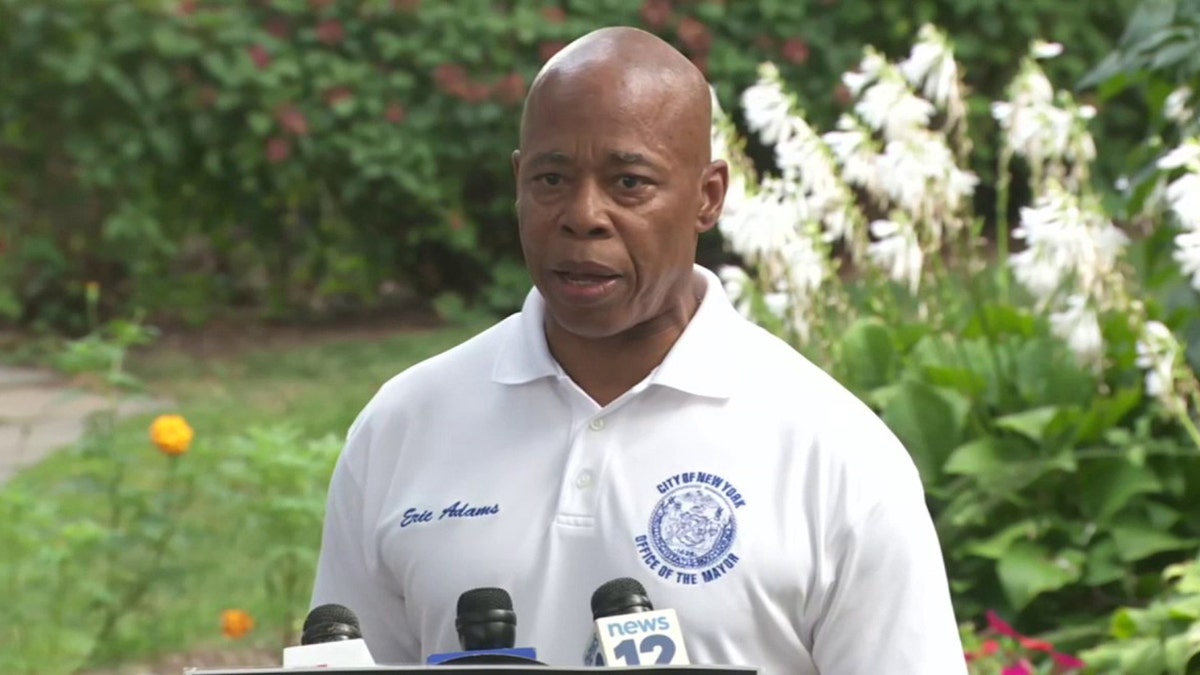Eric Adams speaks to reporters at press conference