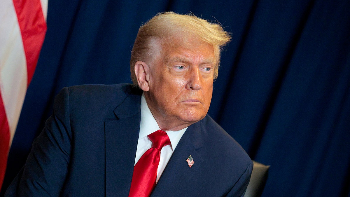 President Donald Trump wearing a red tie