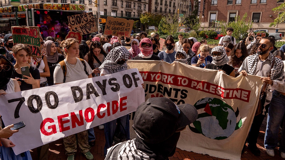 Pro-Palestine protestors gather outside of Columbia University. 