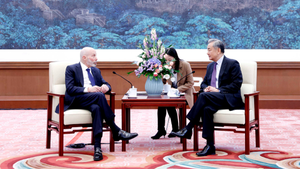 Evan Greenberg with Wang Yi