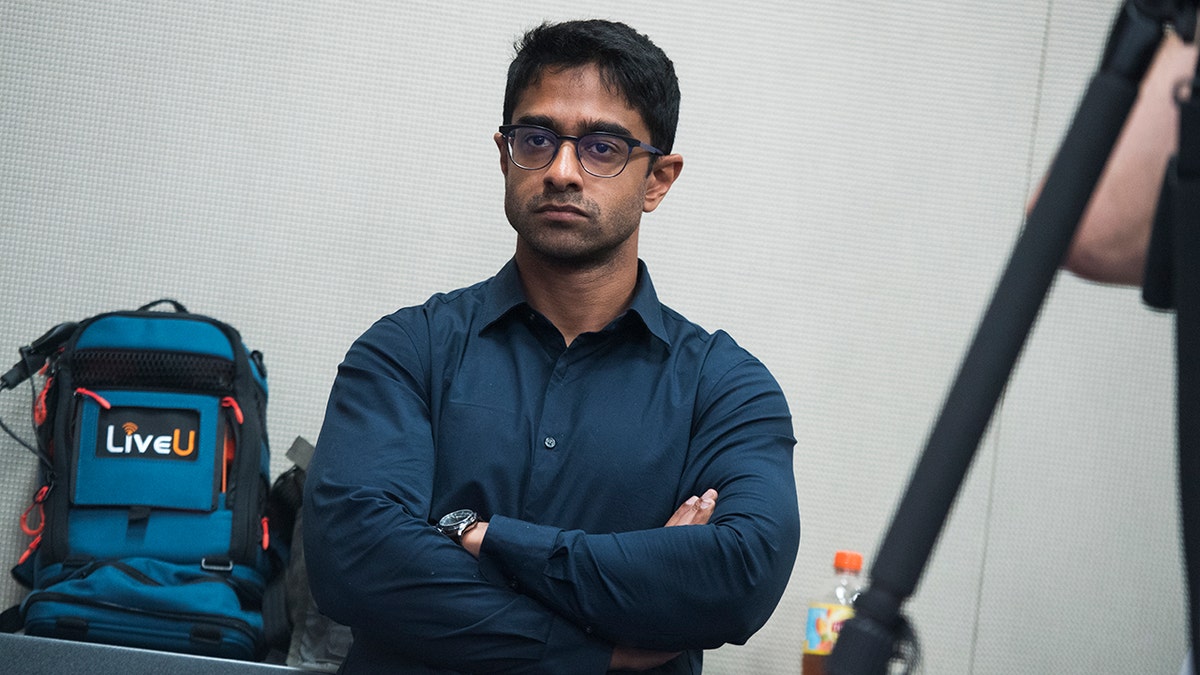 Saikat Chakrabarti arms folded