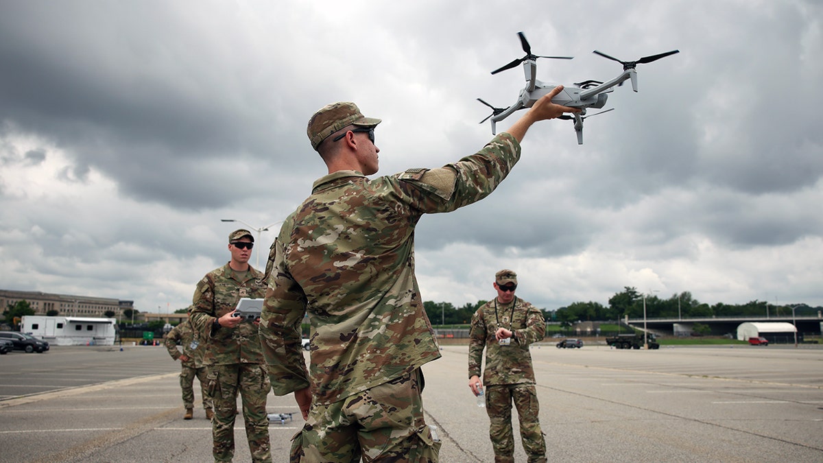 U.S. Soldier holds a drone