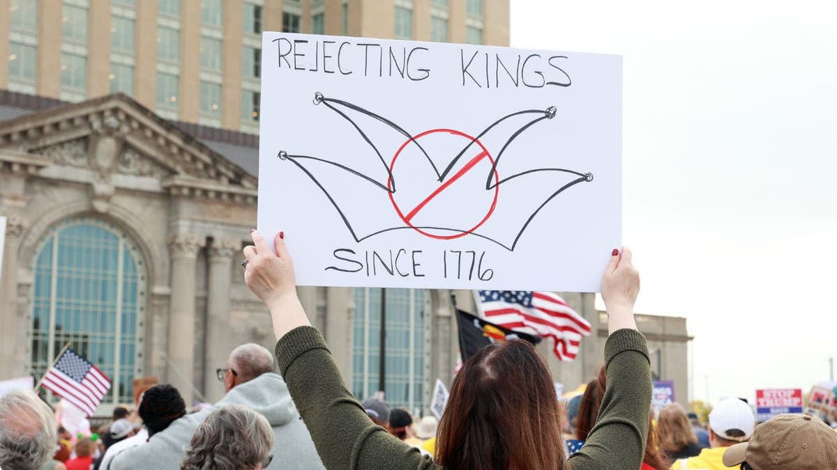A protester appears at the No Kings rally