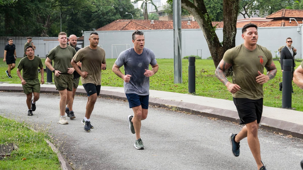 Pete Hegseth running with troops