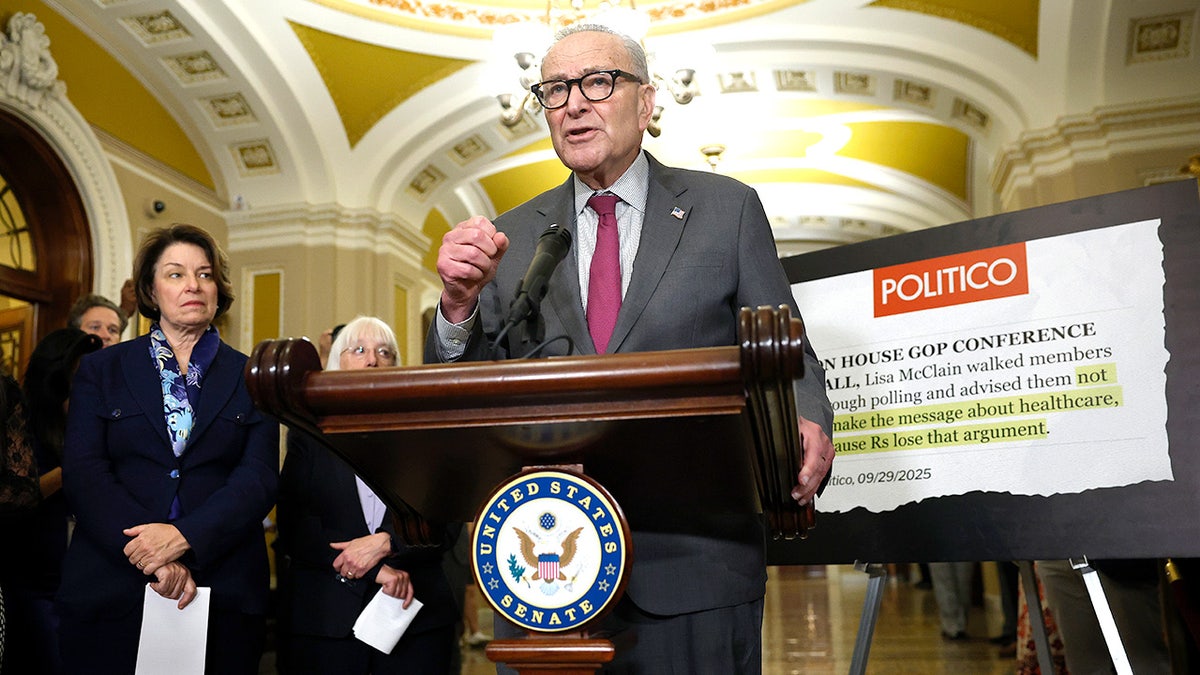 Senate Minority Leader Chuck Schumer speaks at the U.S. Capitol after the Democratic Senate Policy Luncheon on Oct. 7, 2025, alongside Sen. Amy Klobuchar, as the government shutdown continues.