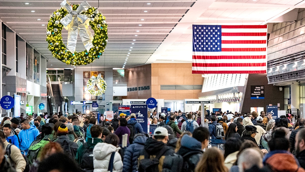 Christmas travelers at Boston's airport 
