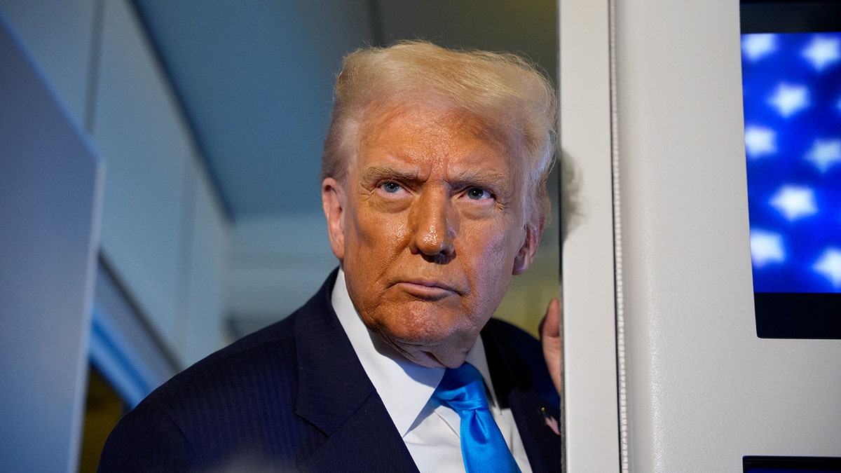 President Donald Trump speaks to journalists aboard Air Force One en route to South Korea on Oct, 29, 2025.