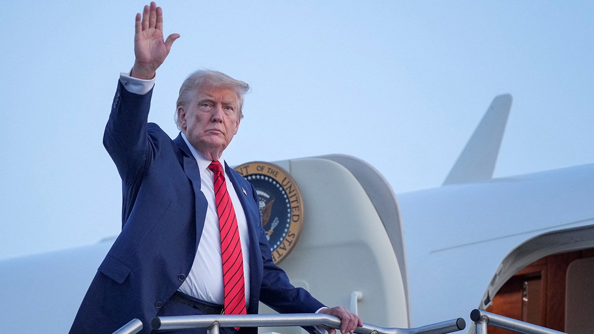 Donald Trump boards Air Force One.