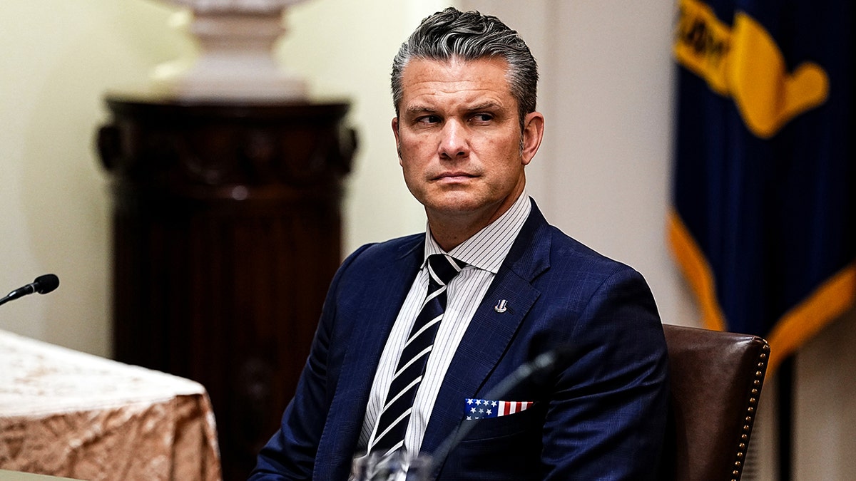 Pete Hegseth at a meeting.