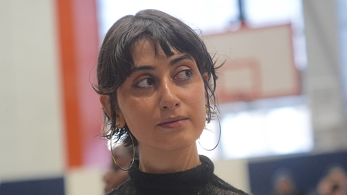 Rama Duwaji looking away from the camera.