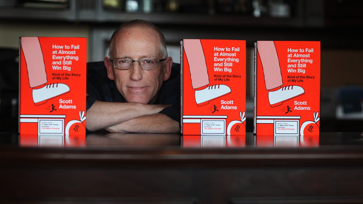Scott Adams, the creator of the 'Dilbert' comic strip, poses for a photo.