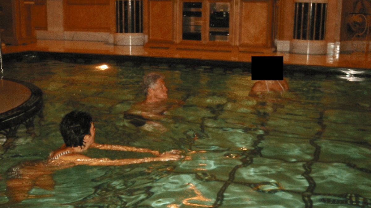 Bill Clinton in a pool in new photo found in the Epstein files