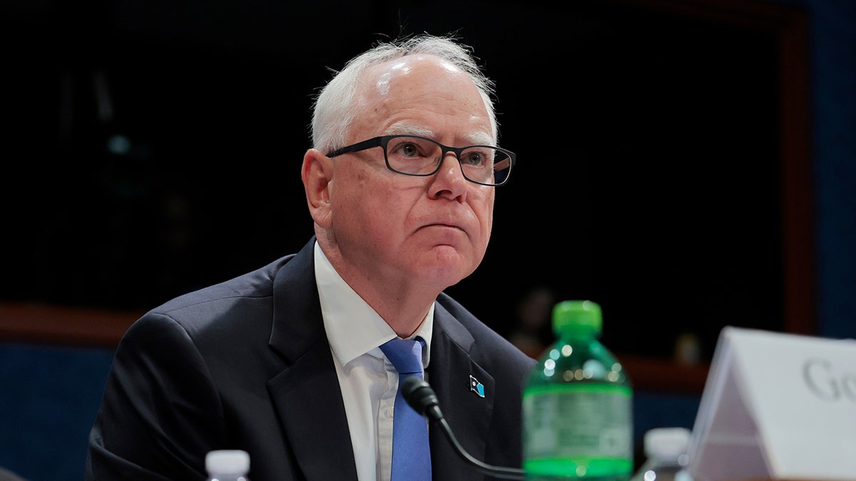 Gov. Tim Walz listening.