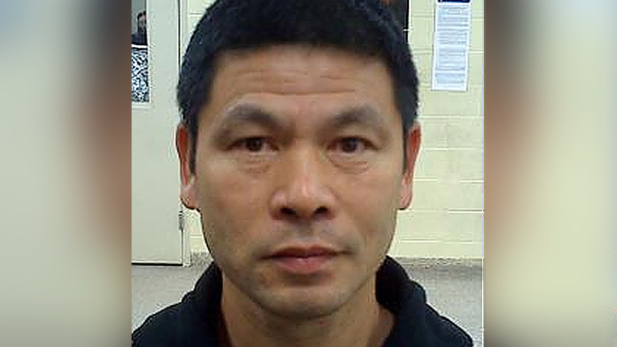 mugshot of Yisong Huang