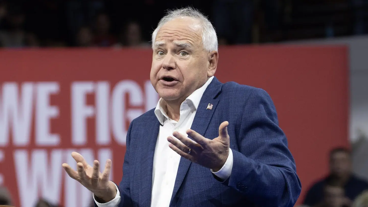 Gov. Tim Walz confused and giving a shrug.