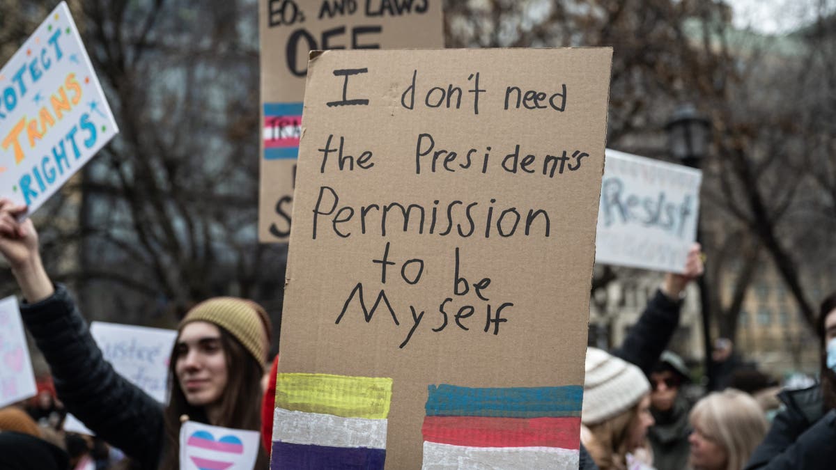 Demonstrators during the Rise Up for Trans Youth rally against President Donald Trump's executive actions targeting transgender people at Union Square in New York, US, on Saturday, Feb. 7, 2025. Three of New York's most prominent hospitals are curbing gender-affirming care for minors after President Donald Trump's executive orders put at risk billions of dollars in federal funding. 