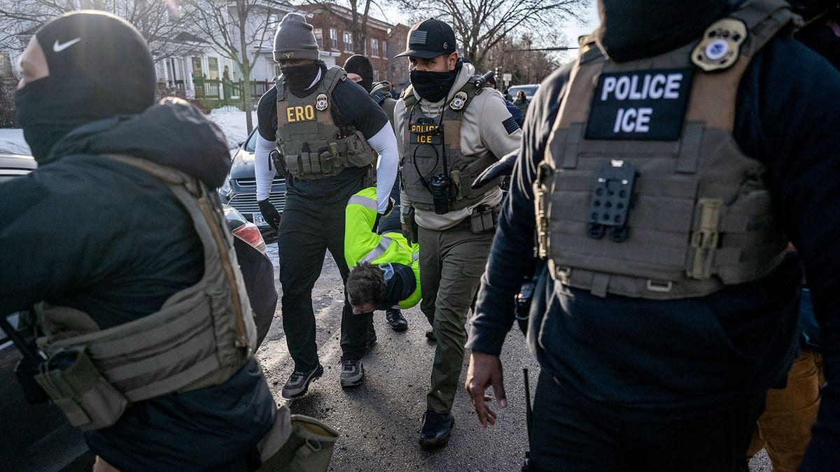 ICE agents in Minneapolis making an arrest