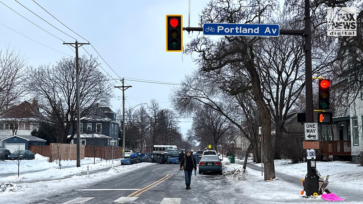 Location of ICE shooting barricaded by residents in Minneapolis