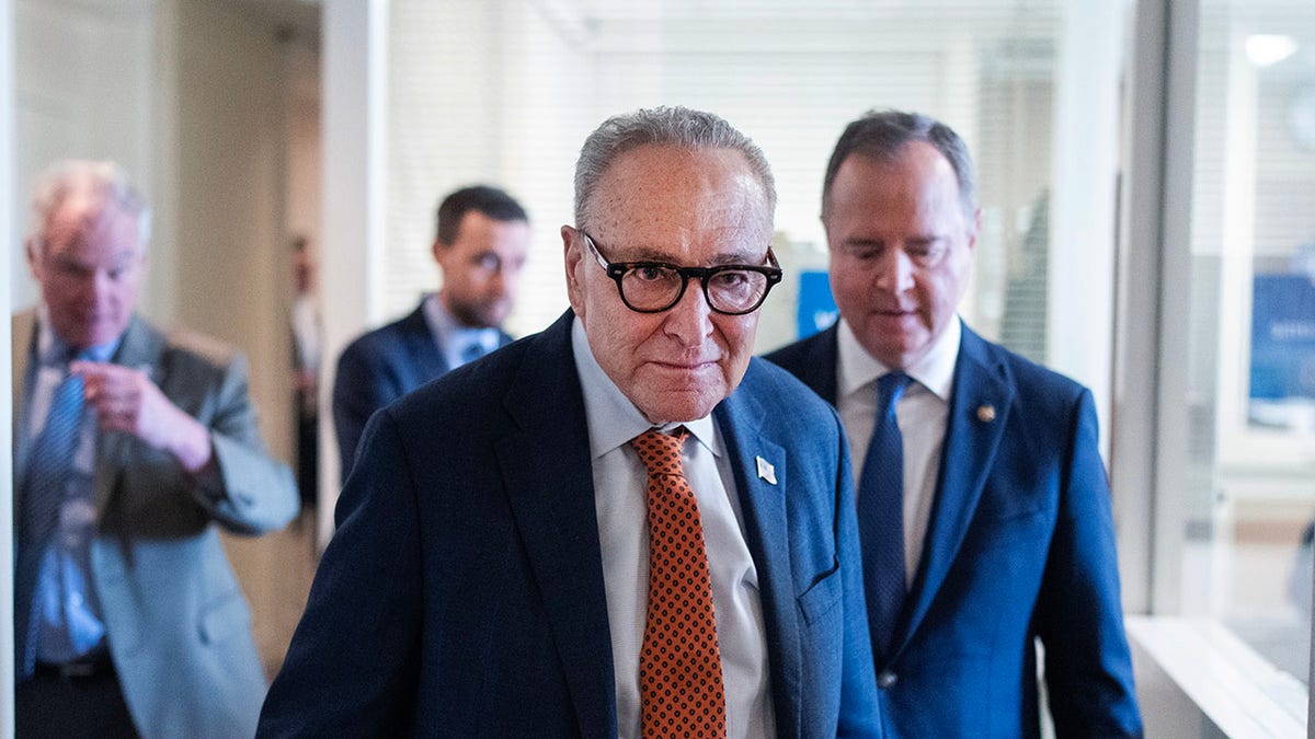 Senate Minority Leader Chuck Schumer, D-N.Y., leaving a press conference.
