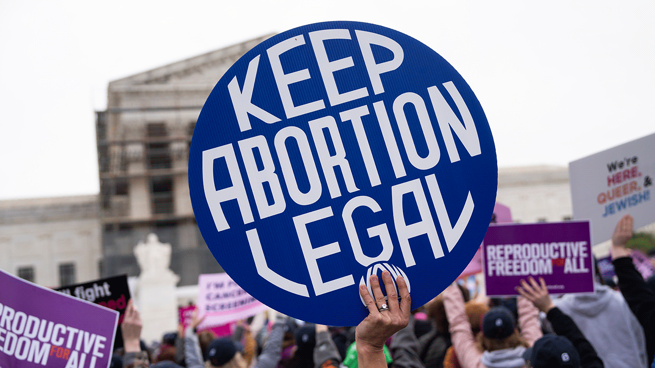 Pro-choice 'Keep Abortion Legal' poster outside Supreme Court