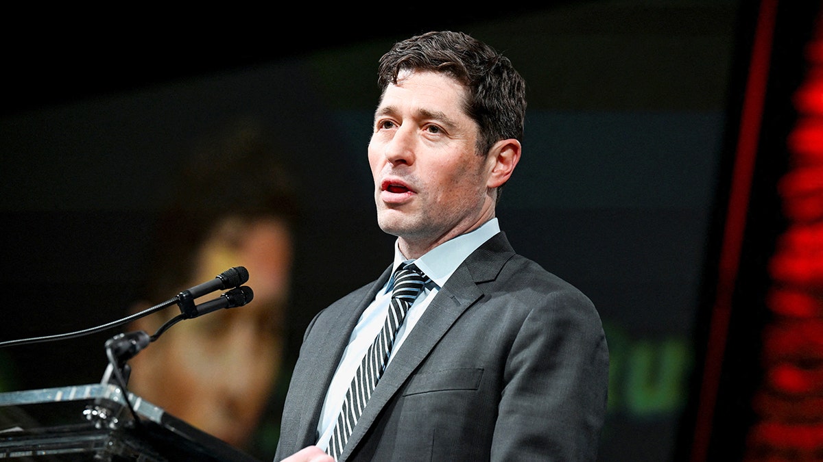Minneapolis Mayor Jacob Frey addresses a group of people