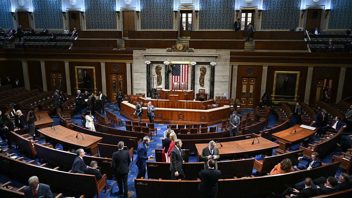 Members of Congress begin to arrive in the House Chamber before US President Donald Trump delivers the State of the Union address