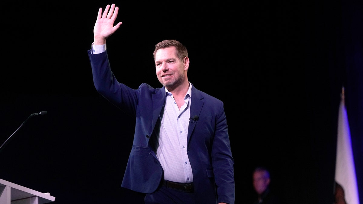 Eric Swalwell steps on stage during Democratic Party State Convention