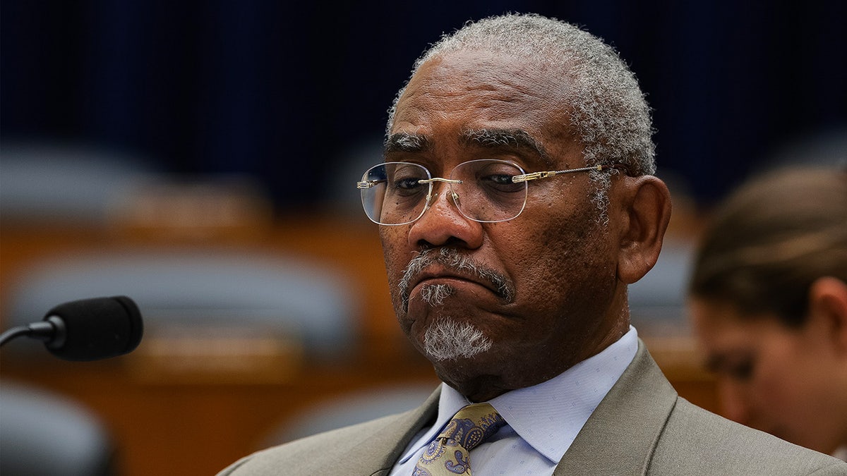 Congressman Gregory Meeks sits in a committee hearing