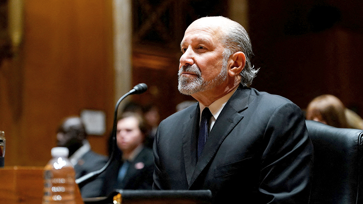 Lutnick sits in Senate hearing