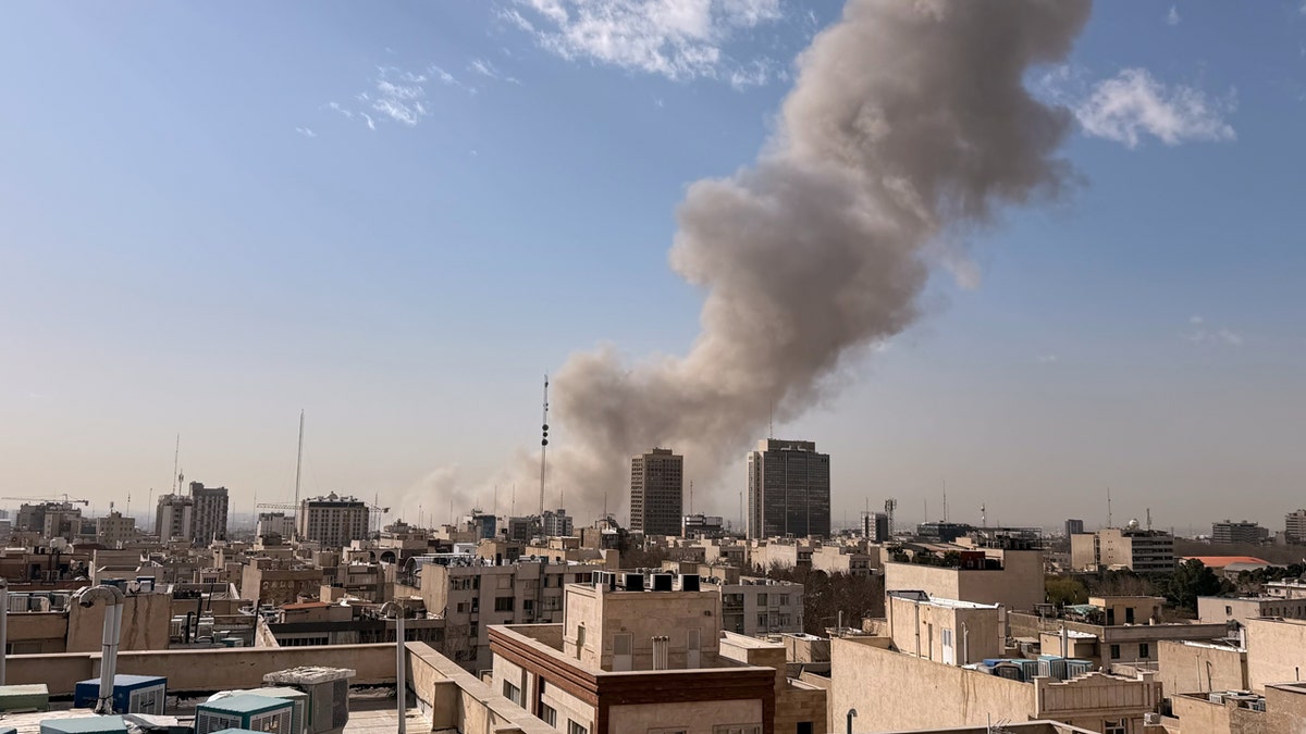Smoke rises on the skyline after an explosion in Tehran, Iran, Saturday, Feb. 28, 2026.