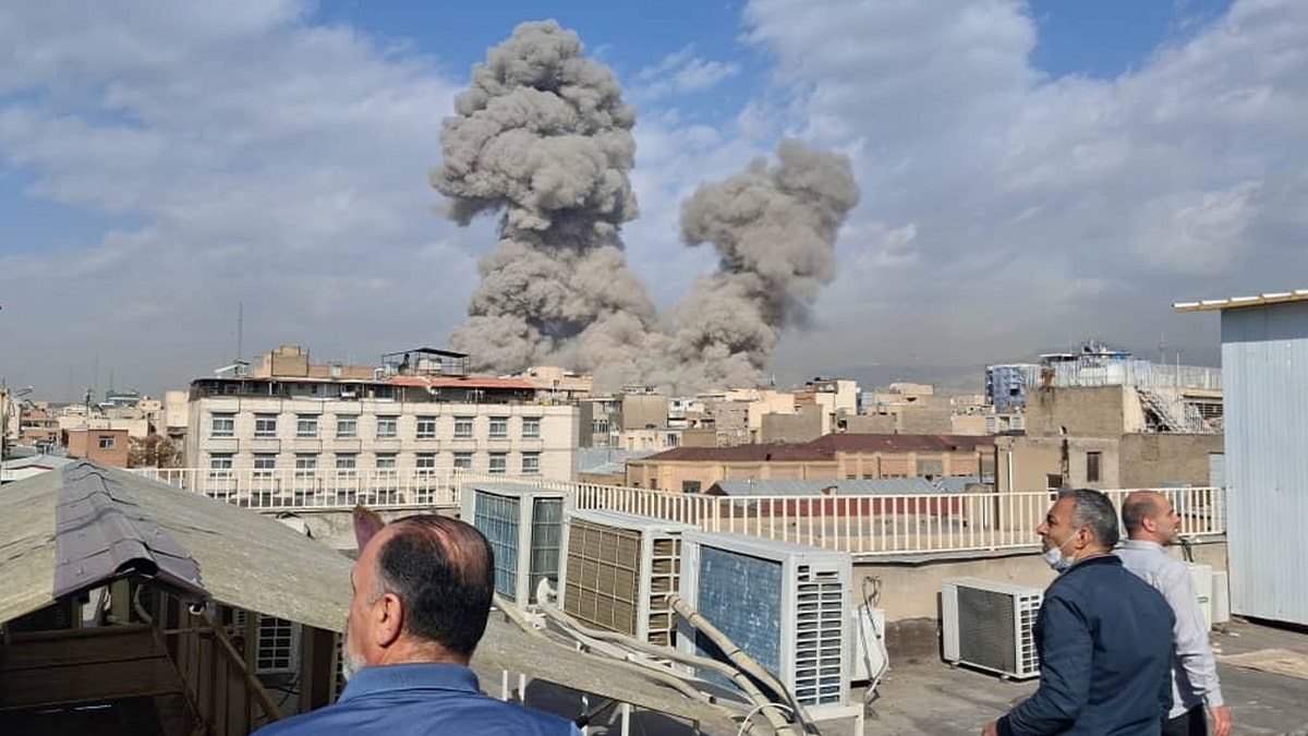 Smoke rising on Tehran skyline after Israel-US attack on Iran