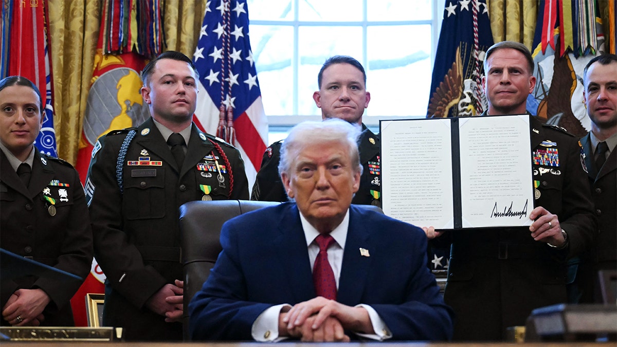 President Donald Trump signs an executive order at the White House on Dec. 15, 2025, in Washington, D.C.