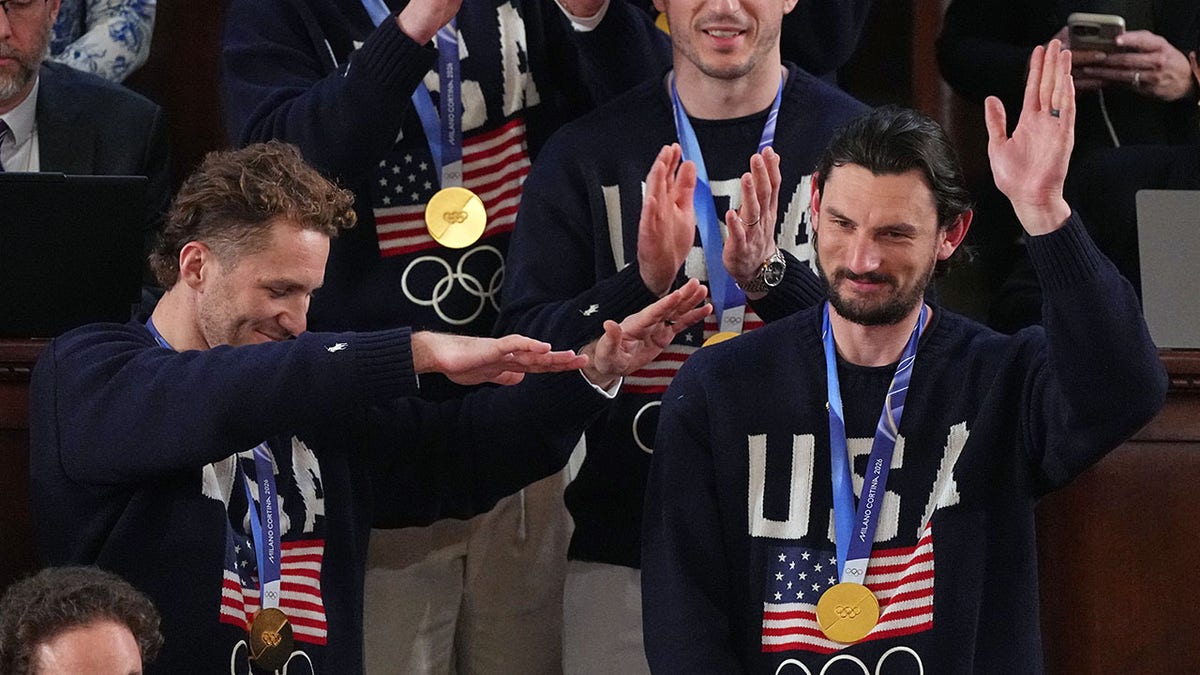 Connor Hellebuyck is applauded